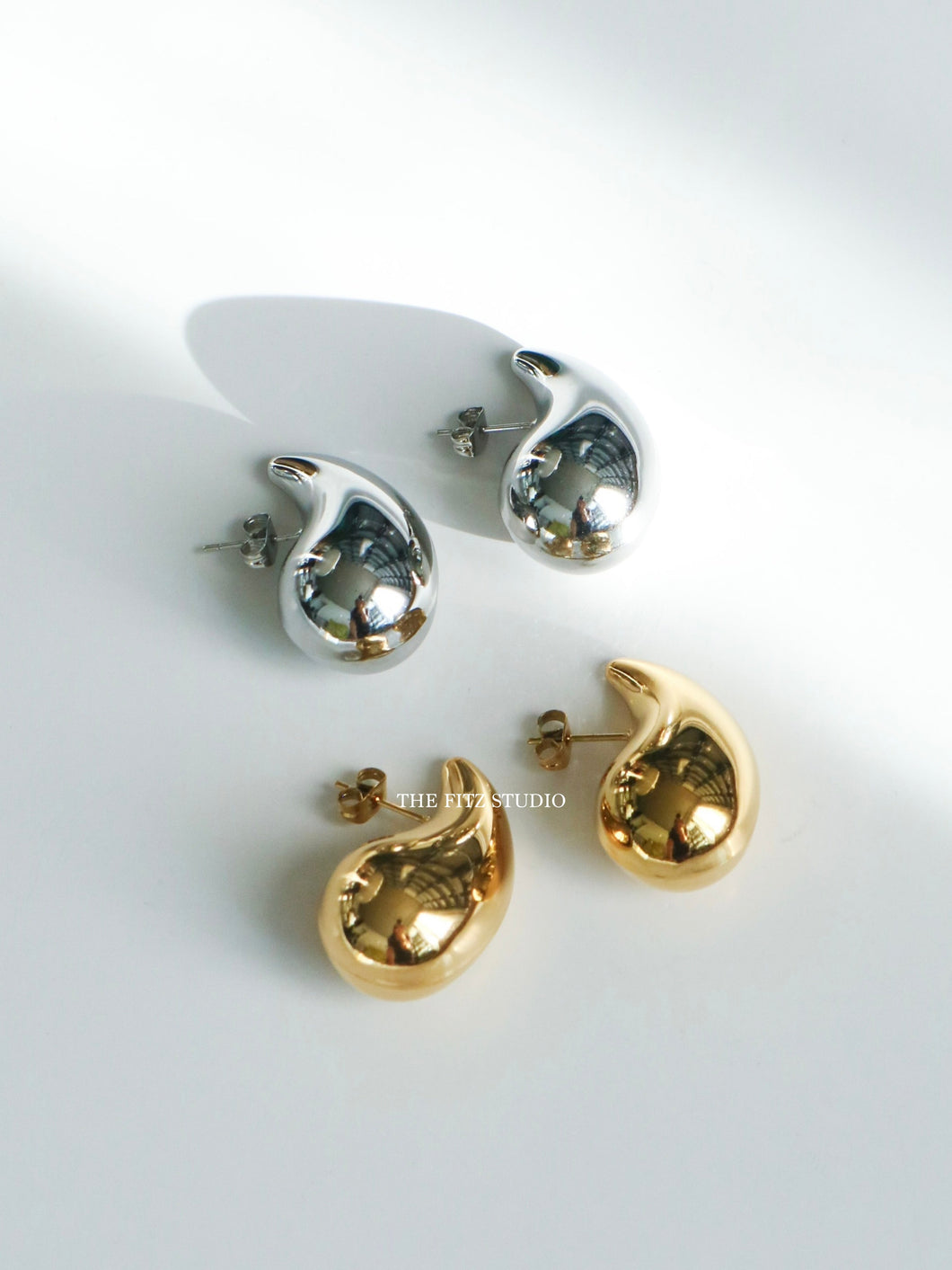 Light hollow Tear Ball Earrings